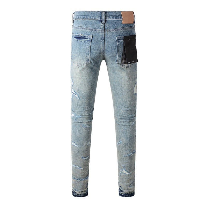 Vaqueros desgastados de color azul claro 9072 con detalles rotos de moda