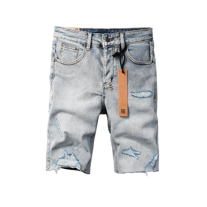 Short en jean déchiré vintage pour homme, délavé clair, avec ourlet brut et détails vieillis, 2003 